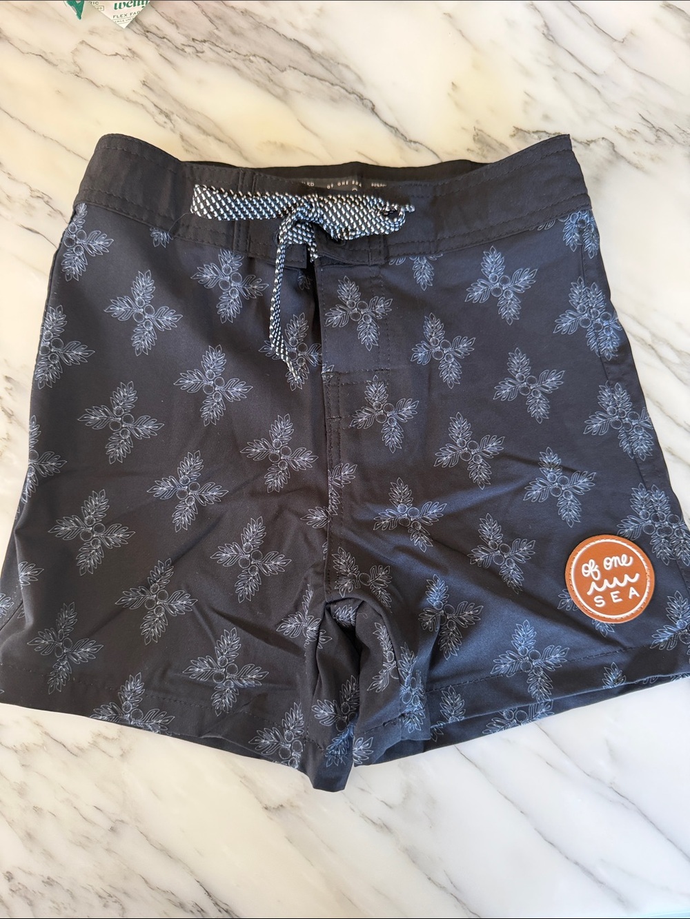 Boys one of sea black swim trunks 7/8 new
